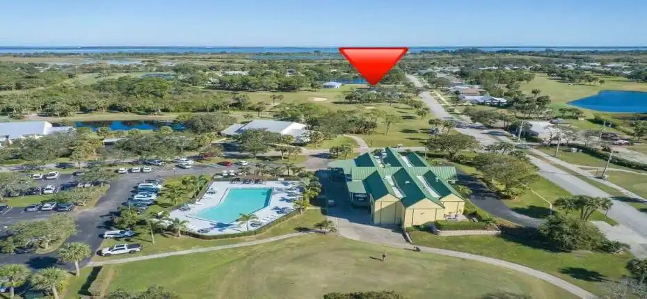 triangle points to lot